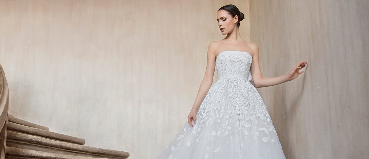 Peter Langner Nadine Wedding Dress - Beautiful Ballgown strapless dress in crinoline embroidered with cut out guipure lace flowers all over and train.