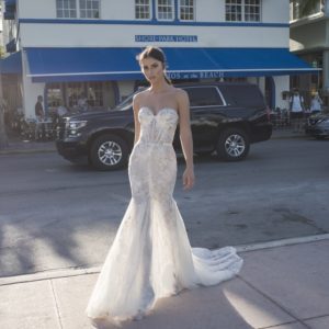 Netta BenShabu Whitney Wedding Dress - Fit and flare style dress with strapless sweetheart neckline, floral details on the waist and boning bodice.