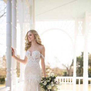 Martina Liana 1012 Wedding Dress Sample Sale - Fit and flare style dress with off the shoulder skinny straps, plunging sweetheart neckline, and floral lace fabric.