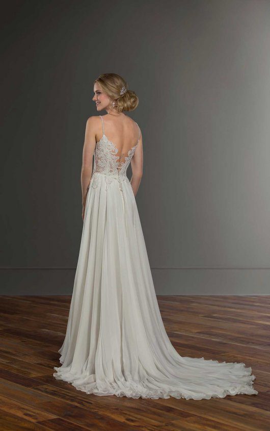 Martina Liana 1031 Wedding Dress - Modified A-line dress featuring a lace bodice with V-sweetheart neckline, pearl-beaded straps and front slit.