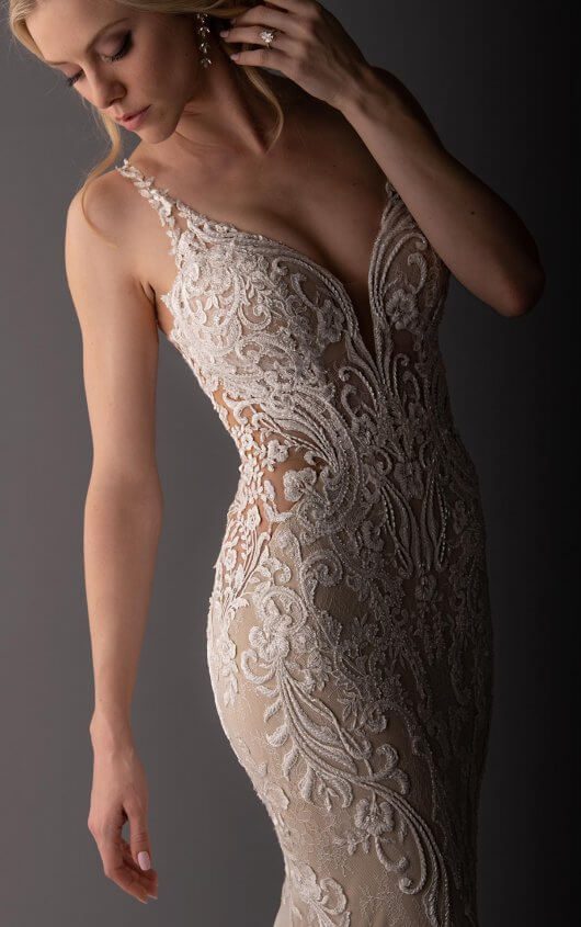 Martina Liana 1111 Wedding Dress - Fit and flare sexy illusion lace style dress with thin straps, deep V- neckline, open back and scalloped train.