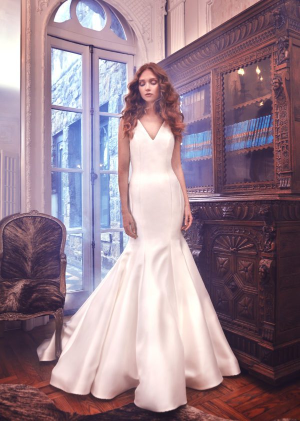 Sareh Nouri Mercer wedding dress - Fitted trumpet gown featuring a V-neckline, V-back, cathedral length train and accented with button detailing