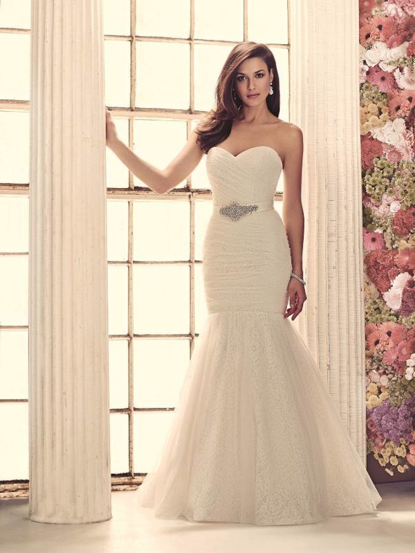 Paloma Blanca 1907 Wedding Dress - Mermaid style with strapless lace sweetheart bodice with tulle overlay in fit and flare silhouette with belt detail.