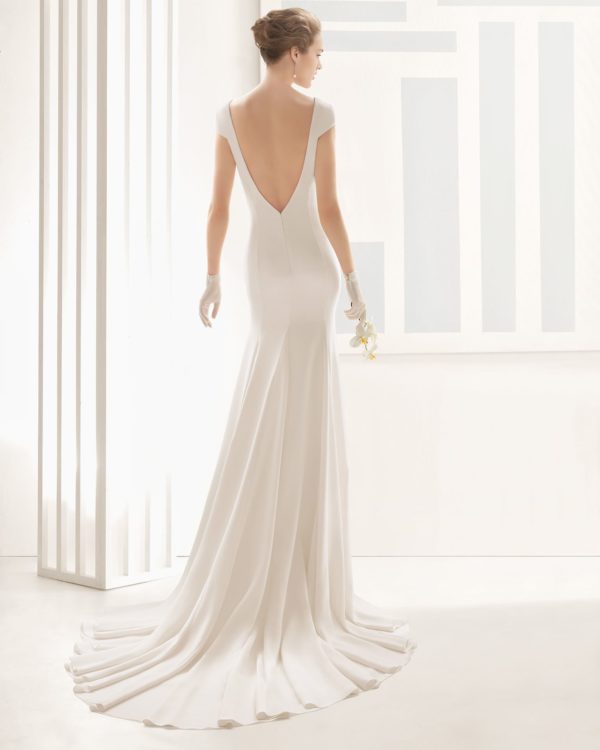 Rosa Clara Couture Dylan Wedding Dress - Smooth crepe fabric sheath-style dress with high bateau neckline, open back, and cap sleeves.