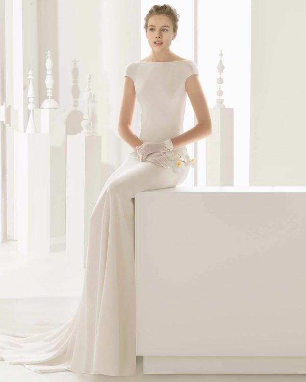 Rosa Clara Couture Dylan Wedding Dress - Smooth crepe fabric sheath-style dress with high bateau neckline, open back, and cap sleeves.