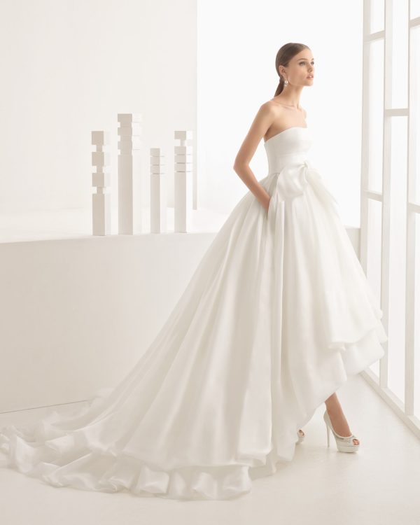 Rosa Clara Collection Nevin Wedding Dress - Ball gown with strapless neckline, cotton satin bodice, full silk organza skirt, petticoat and bow detail.