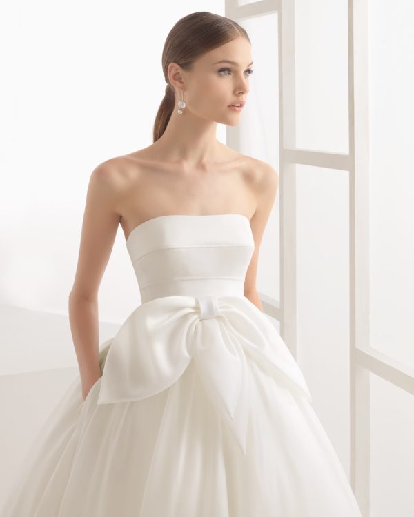 Rosa Clara Collection Nevin Wedding Dress - Ball gown with strapless neckline, cotton satin bodice, full silk organza skirt, petticoat and bow detail.