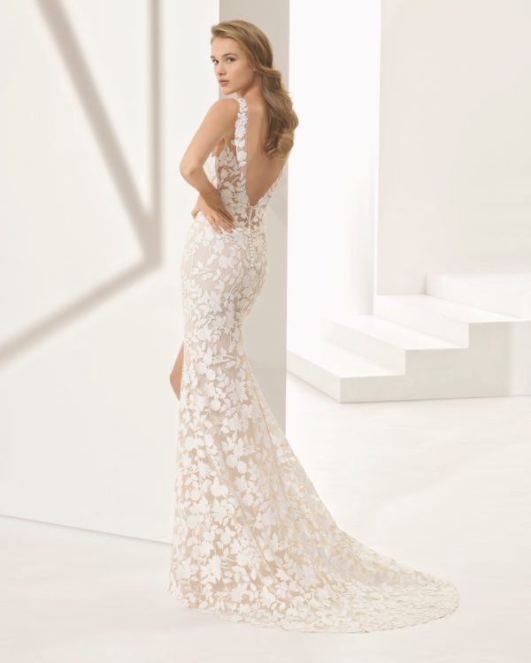 Rosa Clara Couture Panal Wedding Dress - Lace mermaid-style dress that features a low V-neckline, a wide slit in the front, and a low back.