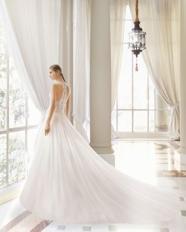 Rosa Clara Couture Malaya Wedding Dress Sample Sale - A Line with embroidered tulle bodice, sheer inserts, deep-plunge neckline, shoulder straps and straight skirt. 
