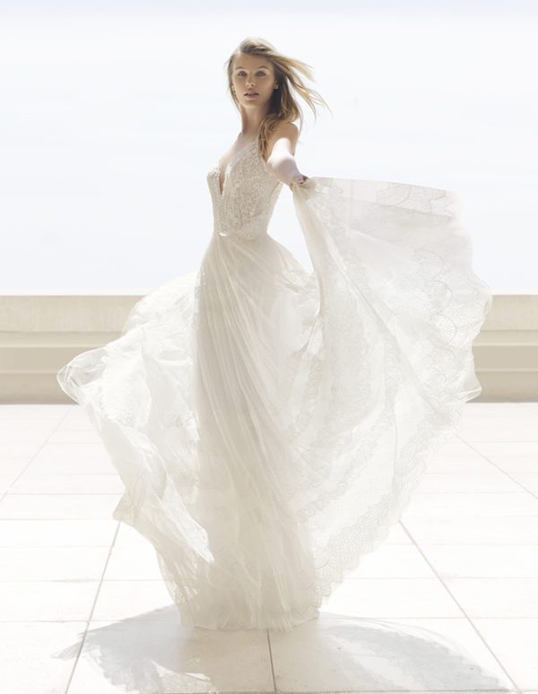 Rosa Clara Couture Perfume Wedding Dress Sample Sale - A line Boho-style dress with alluring beaded lace bodice, sheer inserts and a deep V-neckline.