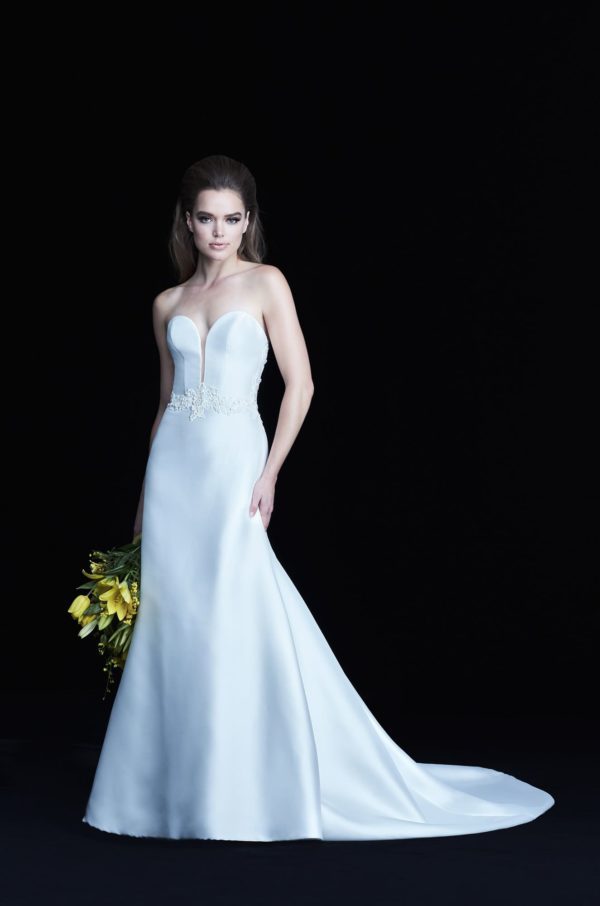 Paloma Blanca 4765 Wedding Dress Sample Sale - Fit and flare guipure Lace and satin Twill with a deep plunging sweetheart neckline, lace on back and belt detail.