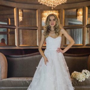 Estee Couture Gigi Wedding Gown - Ballgown style dress with beaded appliqués, Sweetheart Neckline, lightweight construction, and a stunning cathedral train.