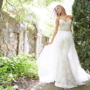 Alvina Valenta 9553 Wedding Dress Sample Sale - Fit and flare dress with sparkle throughout, a strapless sweetheart neckline with a sheer corset back and over skirt.