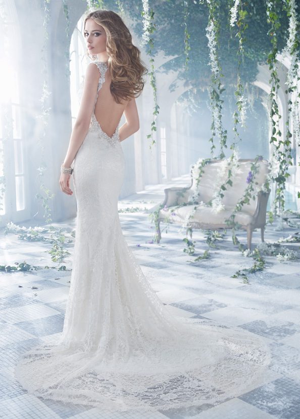 Alvina Valenta 9400 Wedding Dress Sample Sale - Fit and flare style dress with a beautiful plunging, jeweled front and back necklines with cap sleeves.