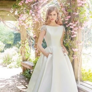Alvina Valenta 9658 Wedding Dress Sample Sale- Ballgown style dress with a stunning bateau neckline, jeweled cap sleeves, side pockets and an open back.