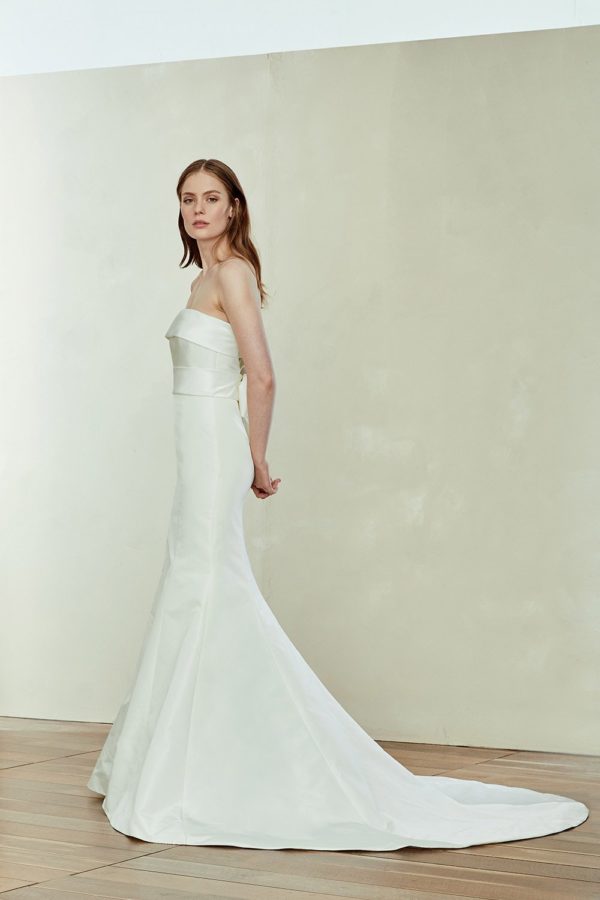 Amsale Aberra Rachel Wedding Dress Sample Sale - Silk faille strapless fit to flare dress with open back and draped taffeta bow detailing.