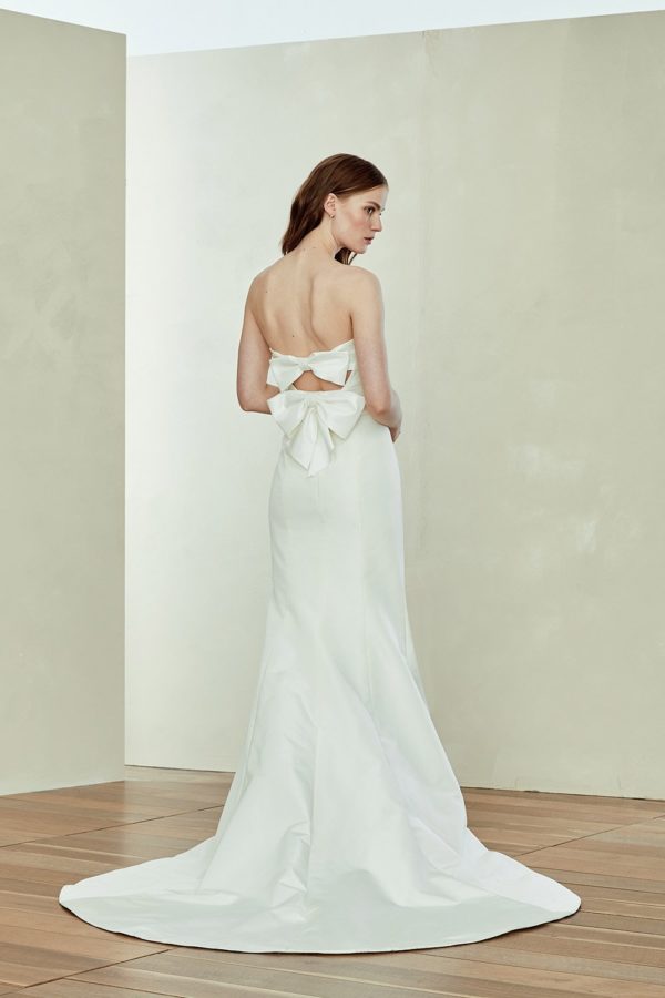 Amsale Aberra Rachel Wedding Dress Sample Sale - Silk faille strapless fit to flare dress with open back and draped taffeta bow detailing.
