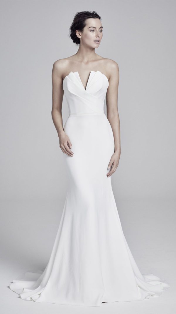 Suzanne Neville Carmella Wedding Dress - Stunning Italian crepe fabric dress with a fit and flare skirt and strapless v-neckline.