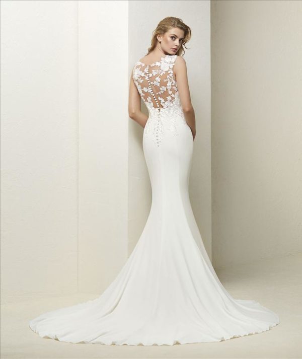 Pronovias Drail Wedding Dress - Mermaid style dress with tulle and floral motifs on bodice, Illusion neck, sweetheart neckline, Cap sleeves and cape.