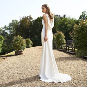 Suzanne Neville Duet Wedding Dress Sample Sale - Modified A-Line silk satin crepe dress with a stunning high neck and delicate beaded back.