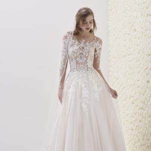 Pronovias Emelina Wedding Dress Sample Sale - Low waist A-Line skirt made with overlapping layers of tulle, high neckline, long sleeves and bateau neck.