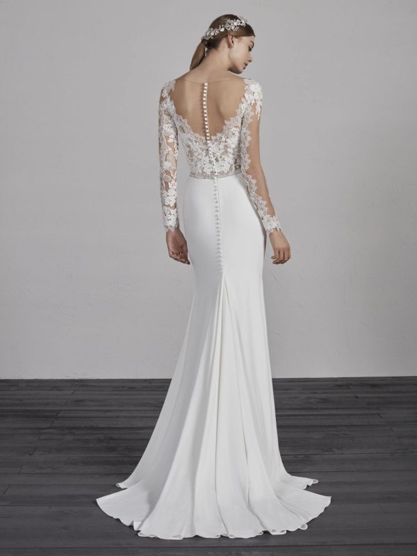 Pronovias Emy Wedding Dress Sample Sale - Mermaid skirt dress with a natural waist and a two-piece effect, Illusion long sleeves, and v-neckline.