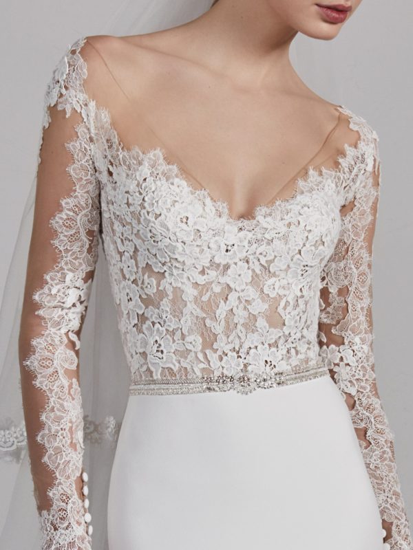 Pronovias Emy Wedding Dress Sample Sale - Mermaid skirt dress with a natural waist and a two-piece effect, Illusion long sleeves, and v-neckline.