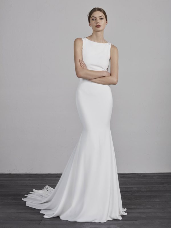 Pronovias Enol Wedding Dress Sample Sale - Crepe mermaid skirt with natural waist, bateau neckline, an illusion back in crystal tulle and floral beading.