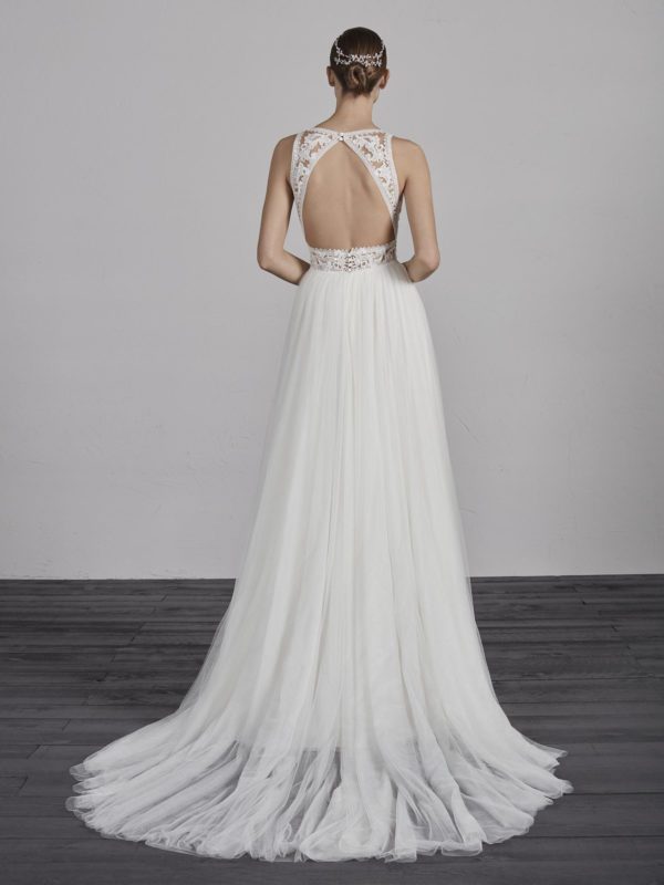 Pronovias Espiga Wedding Dress Sample Sale - A Line two-piece effect dress with flowing skirt, fitted bodice, v-neckline, open back and floral guipure appliqués.