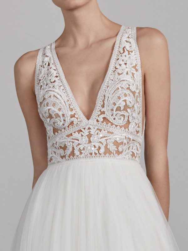 Pronovias Espiga Wedding Dress Sample Sale - A Line two-piece effect dress with flowing skirt, fitted bodice, v-neckline, open back and floral guipure appliqués.