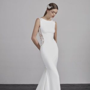 Pronovias Estima Wedding Dress - Crepe mermaid dress with chiffon godets, fitted bodice, round front neckline and stunning V-back, sexy illusion side cut.