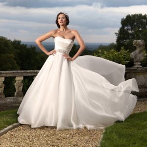 Suzanne Neville Gracie Wedding Dress Sample Sale - Sweetheart neckline style dress in ivory silk with a fitted corset, beaded sash detail, classic train.