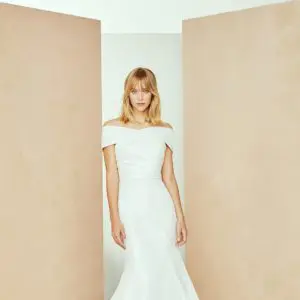 Amsale Aberra Isa Wedding Dress Sample Sale - Fit and flare style dress with an off the shoulder neckline, a stunning crisscross pleated neckline.