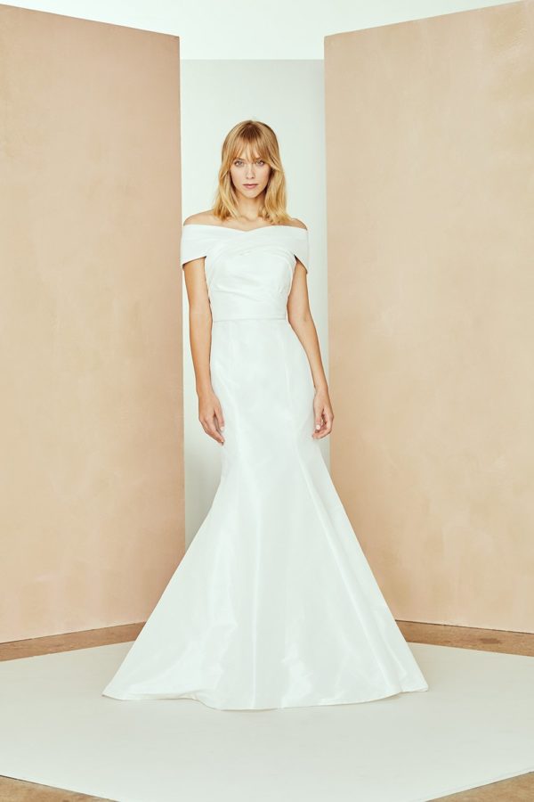 Amsale Aberra Isa Wedding Dress Sample Sale - Fit and flare style dress with an off the shoulder neckline, a stunning crisscross pleated neckline.