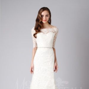 Modern Trousseau Delfina Wedding Dress Sample Sale - Fitted, lace style dress features an off-the-shoulder neckline, 3/4 sleeves and A-line skirt.