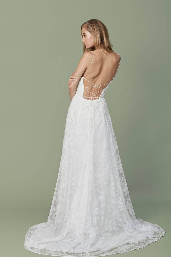 Christos Malia Wedding Dress - Slim lace V neck bridal gown with floral crystal appliqué on bodice and a laced back detail.