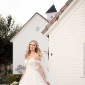 Martina Liana 999 wedding dress - A gorgeous ballgown with allover lace, V- plunging sweetheart neckline, and off the shoulder straps.