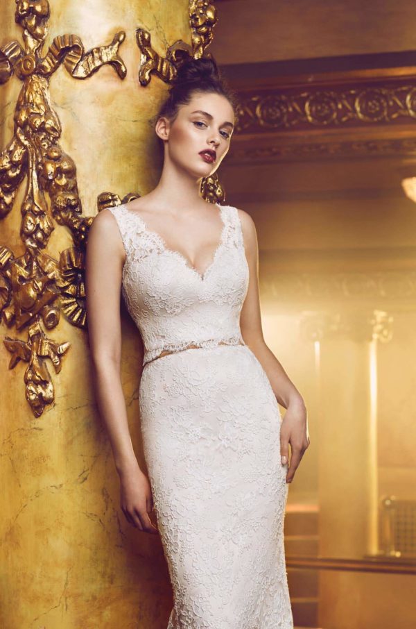 Paloma Blanca 4705 Wedding Dress Sample Sale - Fit and flare style dress with V-neckline crop top, all-over lace, low open v-back and train.