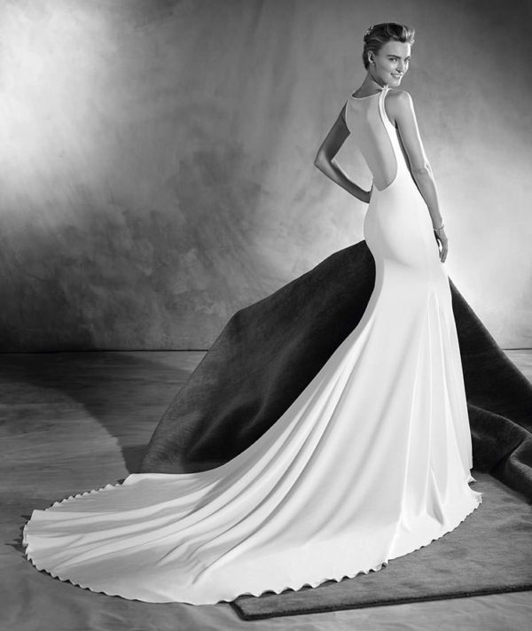 Pronovias Atelier Eimi Wedding Dress Sample Sale - Mermaid dress in crepe with a bateau neckline in the front, a sensual sheer and gauze layer at the back.