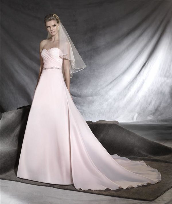 Pronovias Ortuella Wedding Dress Sample Sale - Classic A-line dress with sweetheart neckline, fitted draped bodice, belt detail on dropped waist, and train.