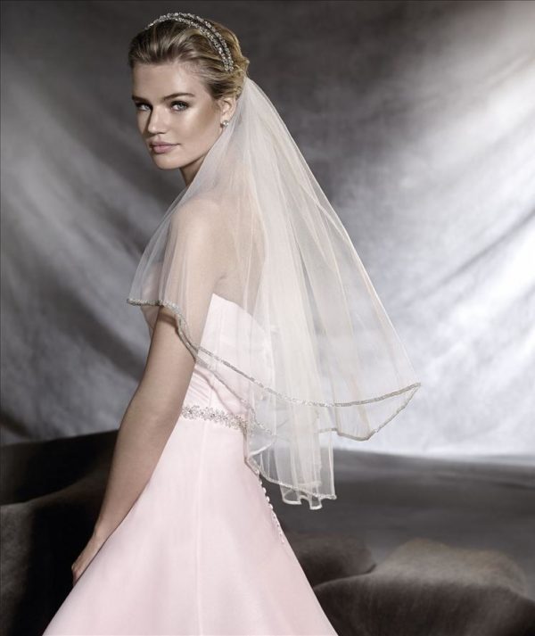 Pronovias Ortuella Wedding Dress Sample Sale - Classic A-line dress with sweetheart neckline, fitted draped bodice, belt detail on dropped waist, and train.