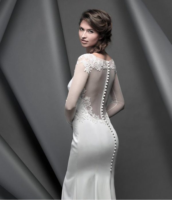 Suzanne Neville Phoenix Wedding Dress Sample Sale - Fit and flare Italian crepe dress with stretch tulle sleeves and illusion back, embroidery and buttons.