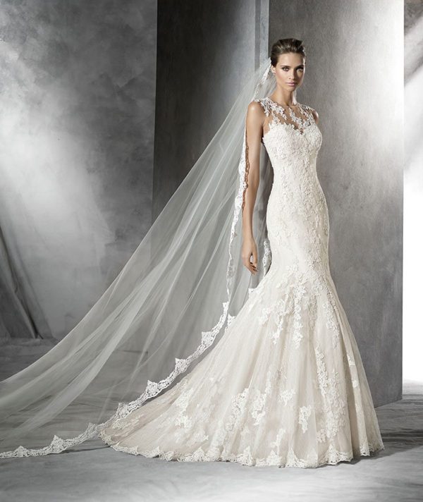 Pronovias Pladie Wedding Dress Sample Sale - Mermaid style dress with fitted bodice with an elegant sheer open back, an illusion neck and sweetheart cut.