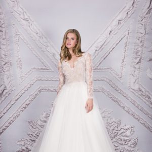 Suzanne Neville Angelico Wedding Dress Sample Sale - Long sleeve ball gown style dress with a beautiful V neckline, lace bodice and tulle skirt.