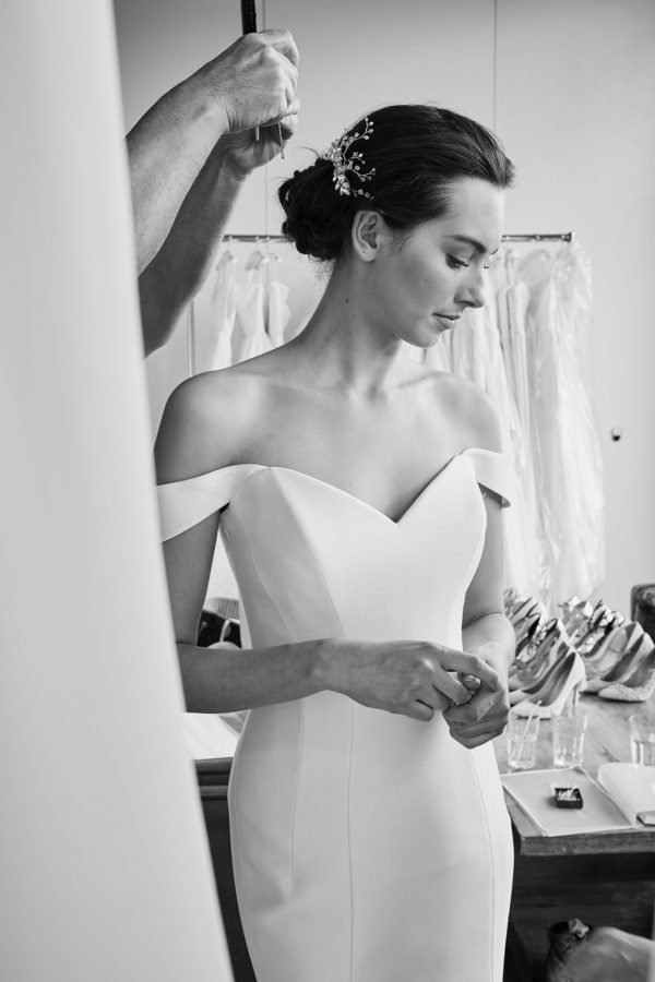Suzanne Neville Alaia Wedding Dress - Elegant fit to flare sweetheart neckline dress with, Italian pique fabric and off the shoulder straps.