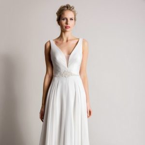 Suzanne Neville Snowdrop Wedding Dress Sample Sale - Modifies A Line with sexy plunging V-neckline, silk chiffon fabric, and silver beading detail at waist.