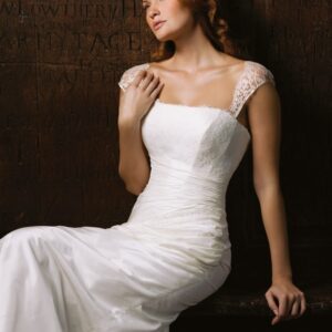 Suzanne Neville Beaujolais Wedding Dress Sample Sale - Scoop neckline fit and flare dress with lace cap sleeves and an asymmetrical ruched lace bodice.