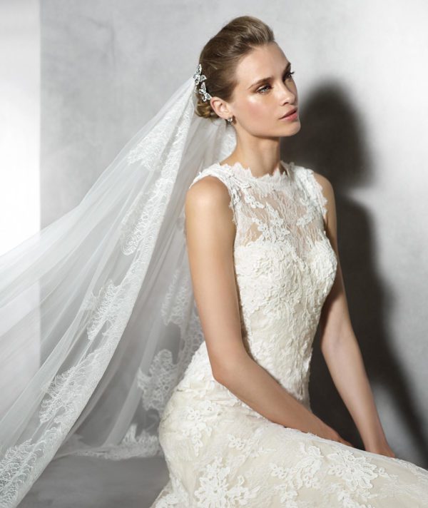 Pronovias Terence Wedding Dress Sample Sale - Mermaid style dress with an elegant strapless sweetheart neckline, illusion high neck, allover lace, open back and train.