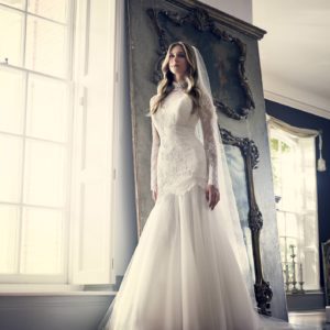 Suzanne Neville Victoriana Wedding Dress - beautiful mermaid style dress with sweetheart neckline, tulle skirt, long lace sleeves and high lace neckline.