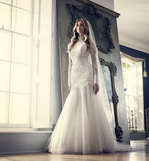 Suzanne Neville Victoriana Wedding Dress Sample Sale - Beautiful mermaid style dress with sweetheart neckline, tulle skirt, long lace sleeves and high lace neckline.